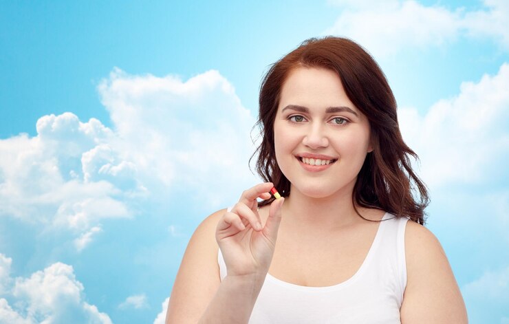 weight-loss-diet-slimming-medicine-people-concept-happy-plus-size-woman-underwear-with-pill-blue-sky-clouds-background_380164-128934