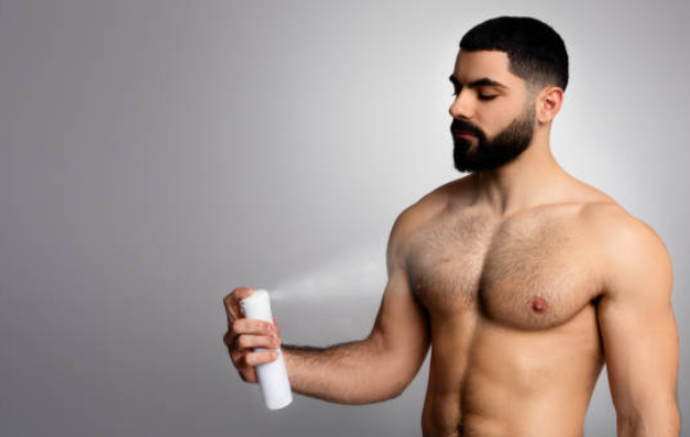 hair removal spray applying men