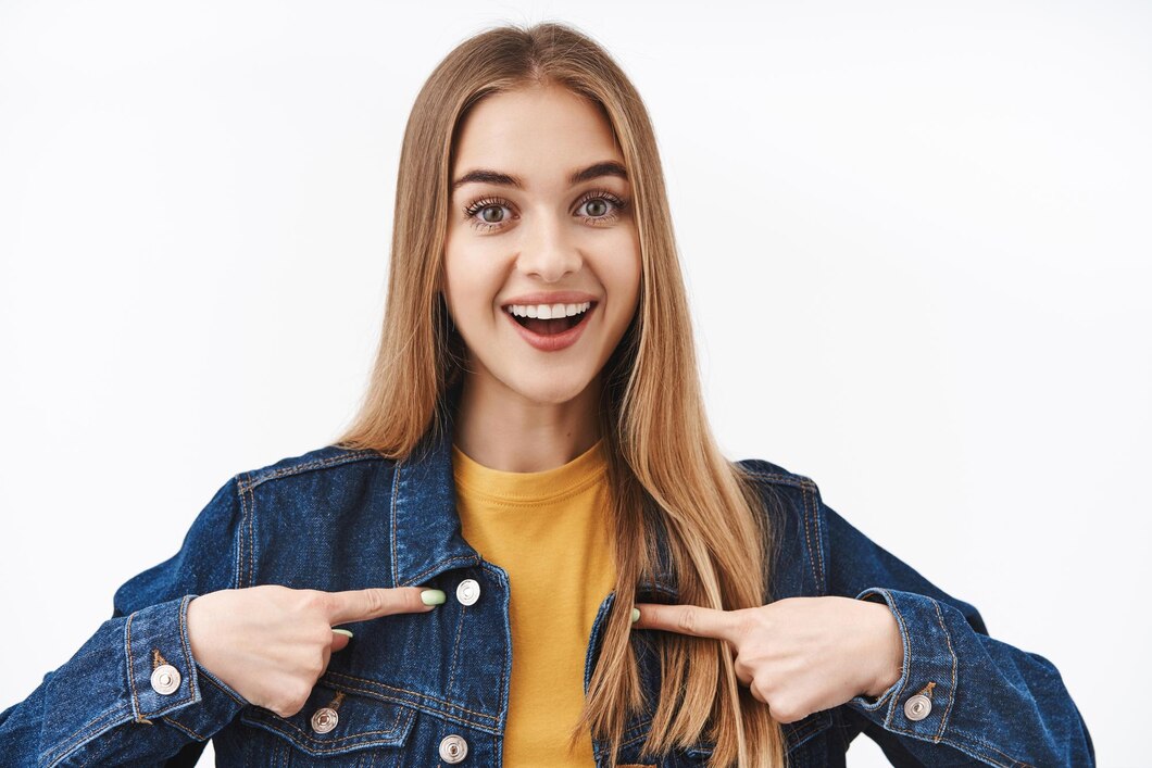 closeup-portrait-excted-happy-cute-young-woman-with-blond-hair-asking-become-member-want-participate-pointing-herself-chest-smiling-best-candidate-job-white-background_176420-56280